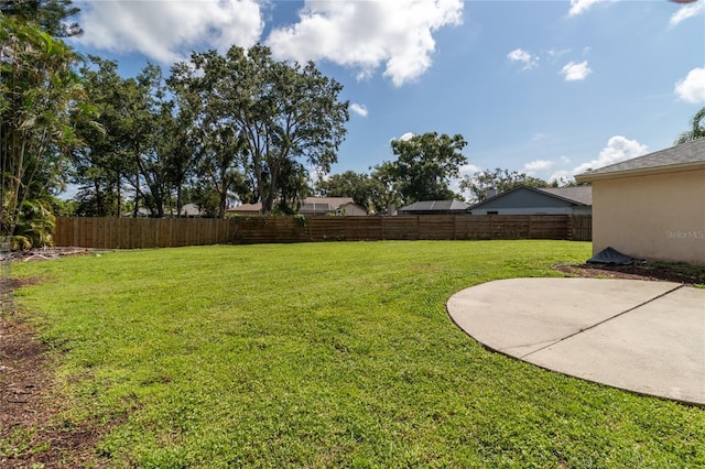 4805 Cypress Lake Ct, Sarasota, FL 34243 - fenced backyard with a patio area