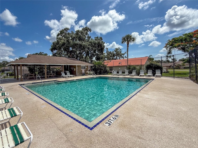 4805 Cypress Lake Ct, Sarasota, FL 34243 - community pool featuring a patio area