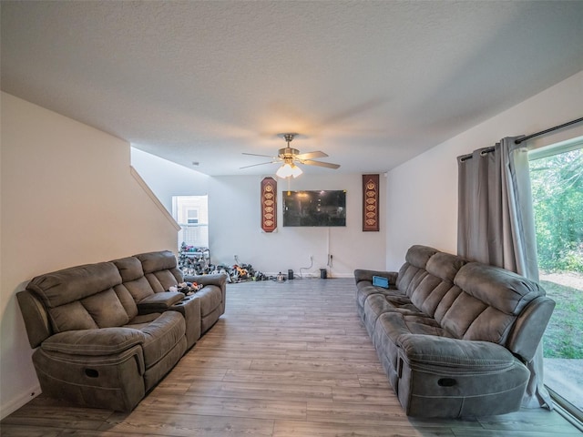 938 Mansfield Rd, Tavares, FL 32778 - living area featuring wood finished floors and ceiling fan