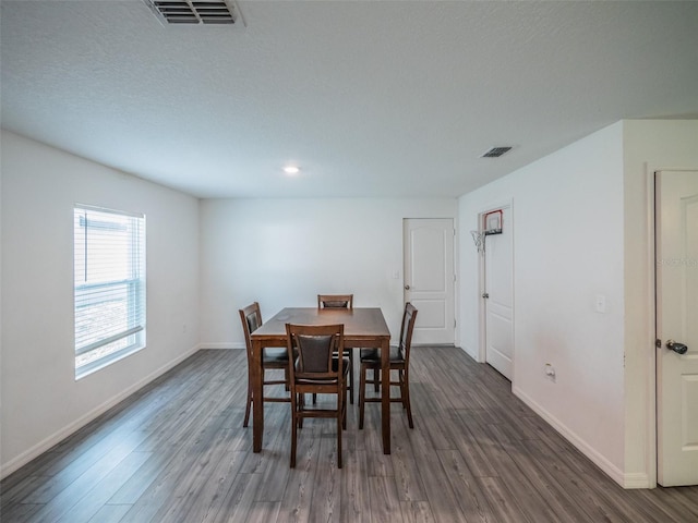938 Mansfield Rd, Tavares, FL 32778 - dining area featuring wood finished floors and recessed lighting