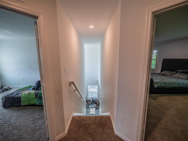938 Mansfield Rd, Tavares, FL 32778 - hall featuring carpet flooring and an upstairs landing