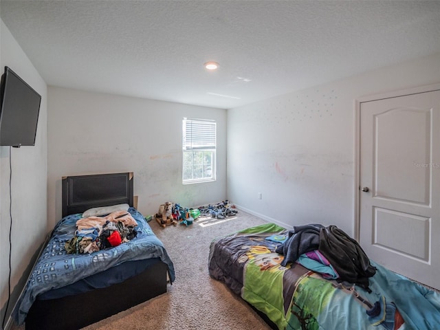 938 Mansfield Rd, Tavares, FL 32778 - carpeted bedroom with a textured ceiling and recessed lighting