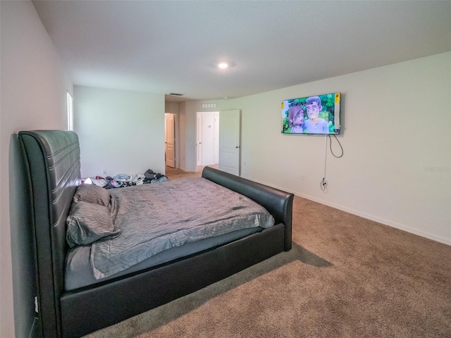 938 Mansfield Rd, Tavares, FL 32778 - carpeted bedroom featuring baseboards and recessed lighting