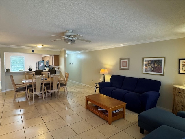 3810 75th St W Unit 137, Bradenton, FL 34209 - living room with crown molding, a ceiling fan, light tile patterned floors, and a textured ceiling