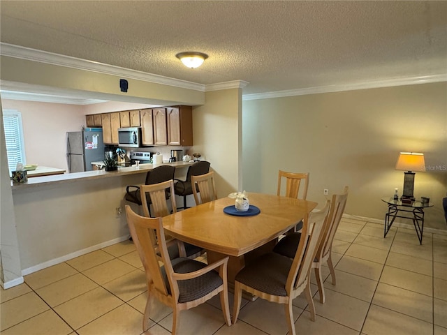 3810 75th St W Unit 137, Bradenton, FL 34209 - dining room with light tile patterned floors, ornamental molding, and a textured ceiling