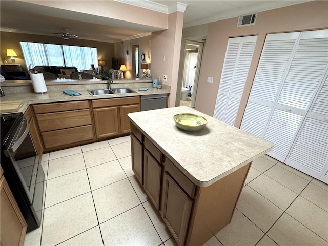 3810 75th St W Unit 137, Bradenton, FL 34209 - kitchen with crown molding, range, open floor plan, ceiling fan, and light tile patterned floors
