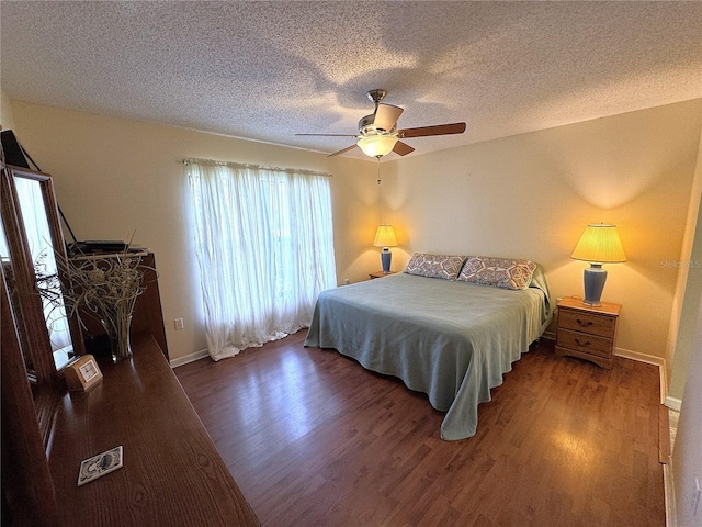3810 75th St W Unit 137, Bradenton, FL 34209 - bedroom with a textured ceiling, wood finished floors, and a ceiling fan