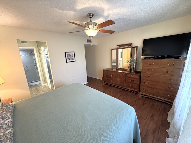 3810 75th St W Unit 137, Bradenton, FL 34209 - bedroom with dark wood finished floors, a textured ceiling, and a ceiling fan