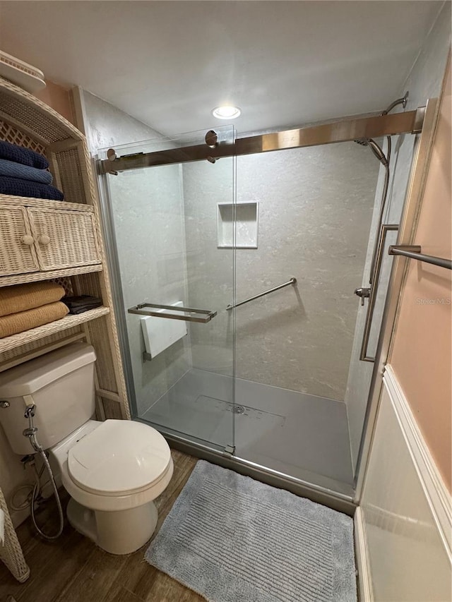 3810 75th St W Unit 137, Bradenton, FL 34209 - bathroom featuring wood finished floors and a shower stall