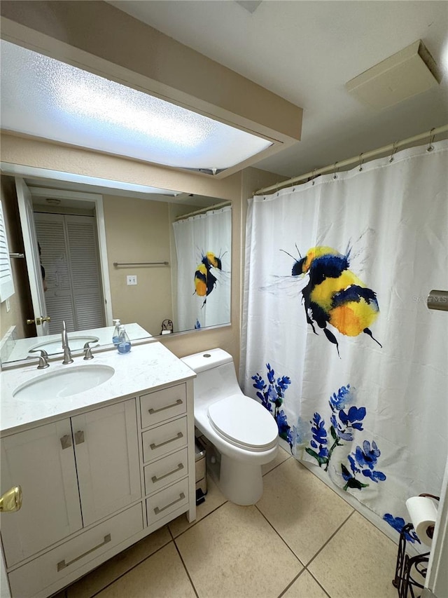 3810 75th St W Unit 137, Bradenton, FL 34209 - full bath featuring tile patterned flooring, vanity, and a shower with shower curtain