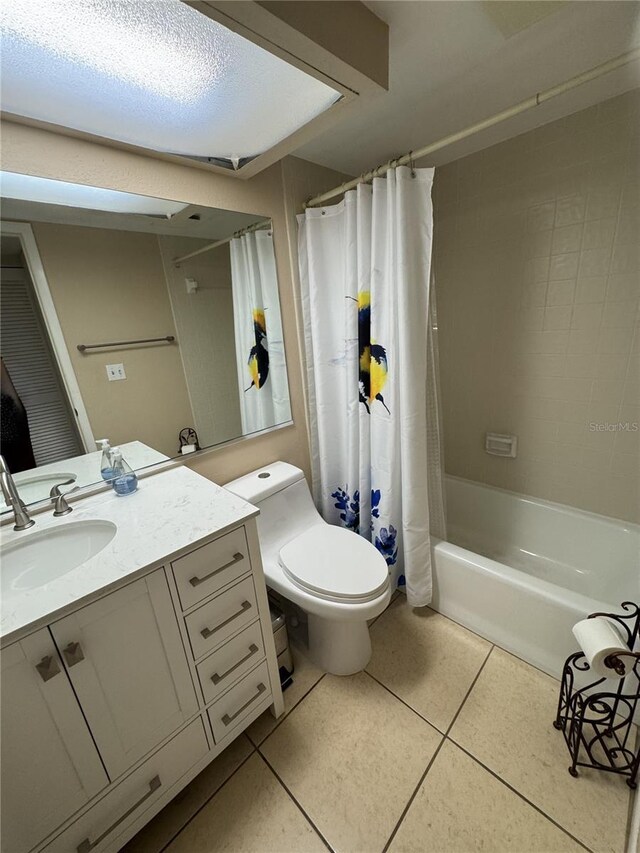 3810 75th St W Unit 137, Bradenton, FL 34209 - full bath with tile patterned flooring, vanity, and shower / bath combo
