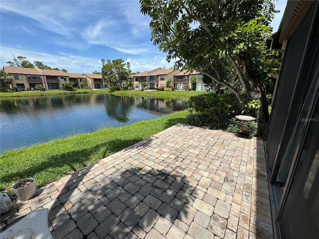 3810 75th St W Unit 137, Bradenton, FL 34209 - view of patio / terrace with a water view and a residential view