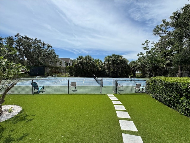 3810 75th St W Unit 137, Bradenton, FL 34209 - view of yard with a tennis court and view of scattered trees