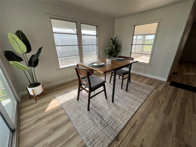 1871 Palm Springs St, Sarasota, FL 34234 - dining space featuring light wood-type flooring and baseboards