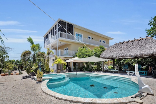 830 Egret Ln, Key Largo, FL 33037 - view of pool featuring a patio area and a pool with connected hot tub