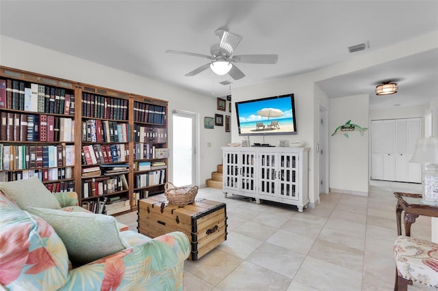 830 Egret Ln, Key Largo, FL 33037 - tiled living area with ceiling fan and baseboards