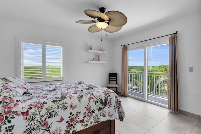 830 Egret Ln, Key Largo, FL 33037 - bedroom featuring access to exterior, multiple windows, light tile patterned flooring, and a ceiling fan