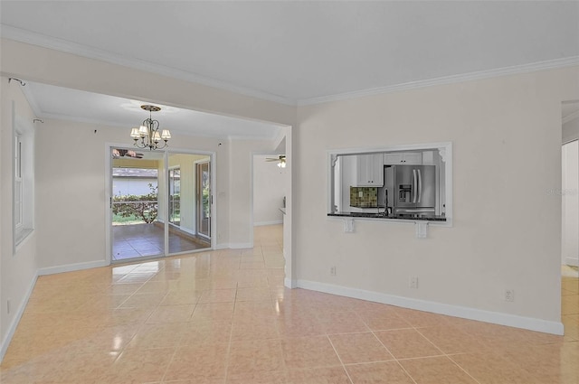 1674 Cottonwood Trl, Sarasota, FL 34232 - empty room featuring a chandelier, ornamental molding, ceiling fan, and light tile patterned flooring