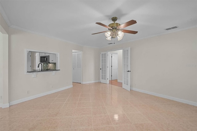 1674 Cottonwood Trl, Sarasota, FL 34232 - unfurnished room featuring french doors, ceiling fan, and ornamental molding