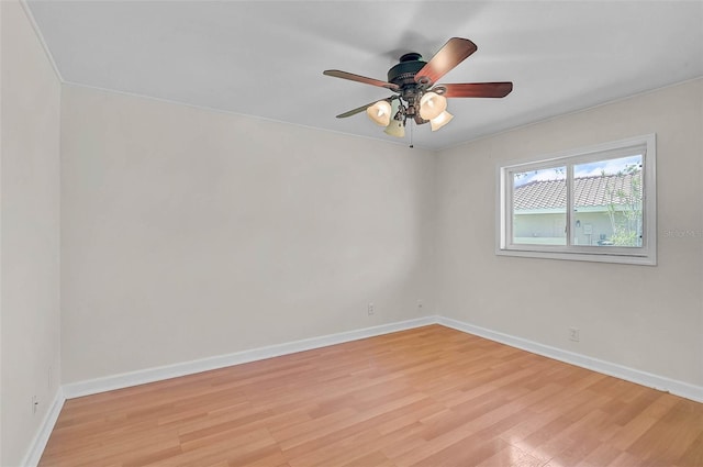 1674 Cottonwood Trl, Sarasota, FL 34232 - empty room with light wood-type flooring and a ceiling fan