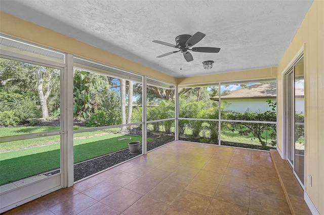 1674 Cottonwood Trl, Sarasota, FL 34232 - unfurnished sunroom featuring a ceiling fan and plenty of natural light