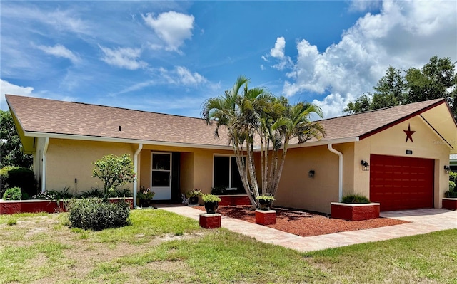 6806 18th Ave W, Bradenton, FL 34209 - ranch-style house with an attached garage, stucco siding, and a front lawn