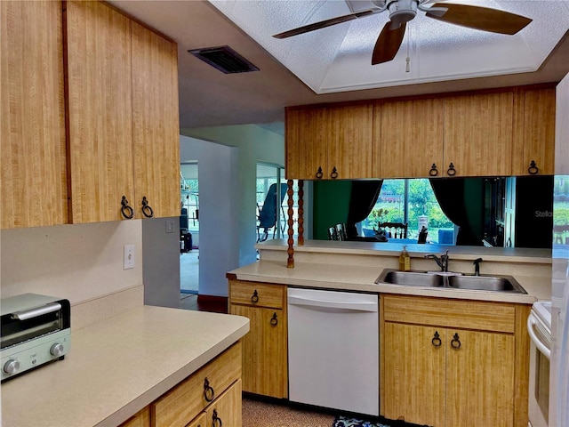6806 18th Ave W, Bradenton, FL 34209 - kitchen with white appliances, light countertops, a ceiling fan, plenty of natural light, and a textured ceiling