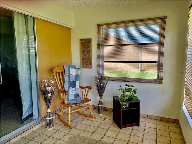 6806 18th Ave W, Bradenton, FL 34209 - living area featuring plenty of natural light and light tile patterned flooring