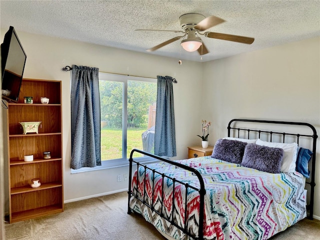 6806 18th Ave W, Bradenton, FL 34209 - carpeted bedroom featuring multiple windows, a textured ceiling, and ceiling fan