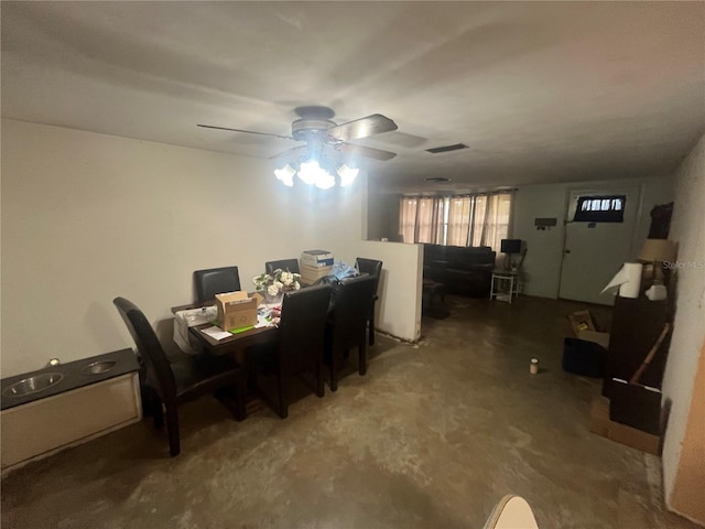 11234 Areca Dr, Port Richey, FL 34668 - dining room featuring a ceiling fan