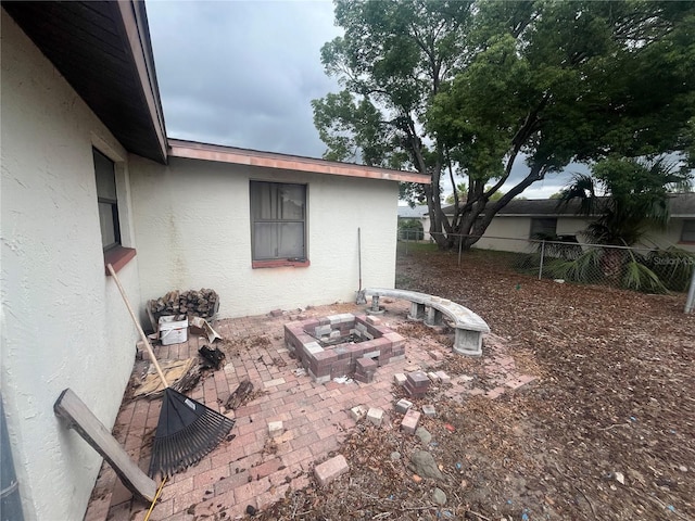 11234 Areca Dr, Port Richey, FL 34668 - view of patio with a fire pit