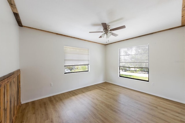 4508 101st St W Unit A, Bradenton, FL 34210 - spare room with wood finished floors, a ceiling fan, and ornamental molding