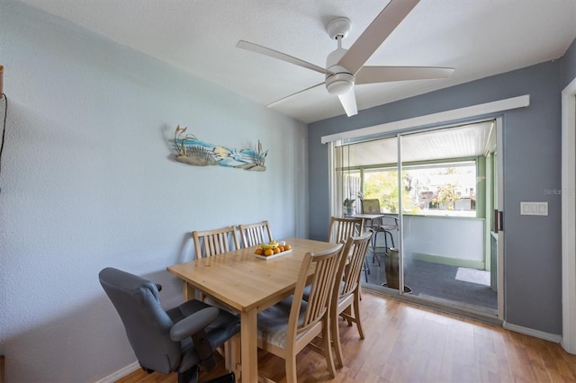 4508 101st St W Unit A, Bradenton, FL 34210 - dining area with ceiling fan and light wood-style floors