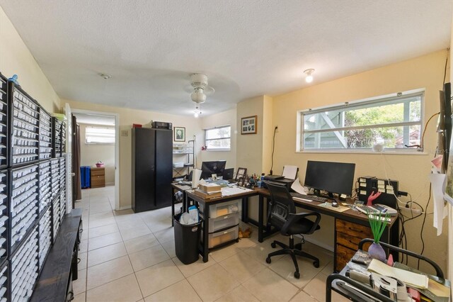4508 101st St W Unit A, Bradenton, FL 34210 - office with light tile patterned floors, ceiling fan, and a textured ceiling