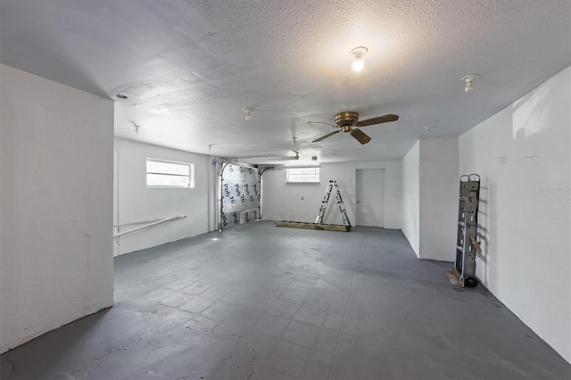 4508 101st St W Unit A, Bradenton, FL 34210 - basement featuring a textured ceiling and ceiling fan