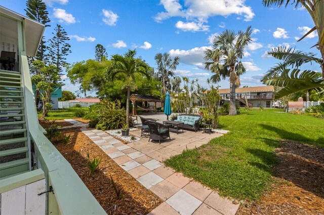 4508 101st St W Unit A, Bradenton, FL 34210 - view of green lawn featuring a patio, a gazebo, and an outdoor living space