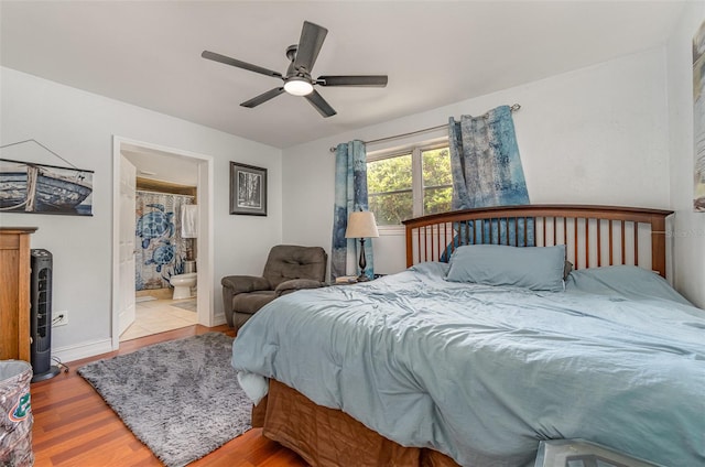 4481 Lagg Ave, Fort Myers, FL 33901 - bedroom featuring wood finished floors, a ceiling fan, and ensuite bathroom