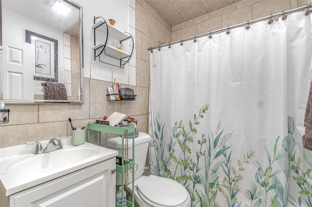 4481 Lagg Ave, Fort Myers, FL 33901 - bathroom with tile walls, vanity, backsplash, and a shower with curtain