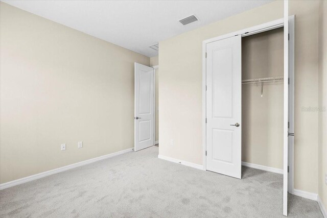 9292 Tequila Sunrise Dr, Sarasota, FL 34241 - unfurnished bedroom with carpet floors and a closet