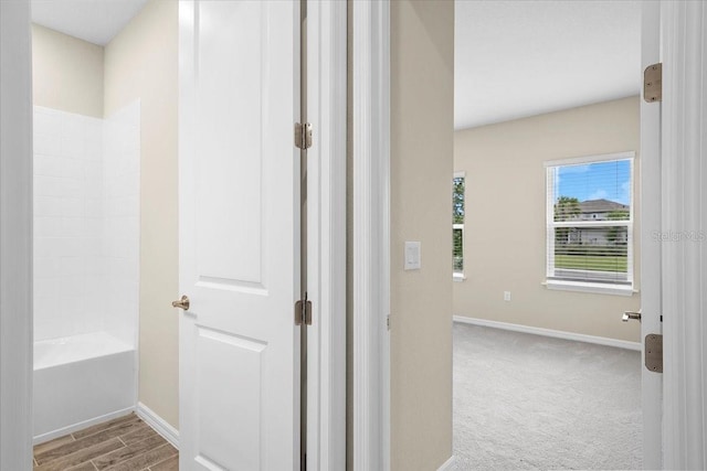 9292 Tequila Sunrise Dr, Sarasota, FL 34241 - hall with baseboards and carpet flooring