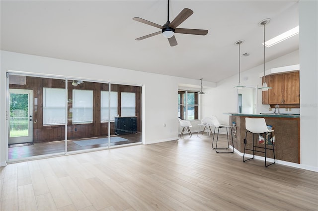 6114 68th Dr E, Palmetto, FL 34221 - living area with ceiling fan, light wood finished floors, and high vaulted ceiling