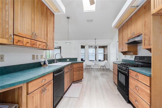 6114 68th Dr E, Palmetto, FL 34221 - kitchen with black appliances, under cabinet range hood, dark countertops, light wood-style flooring, and vaulted ceiling