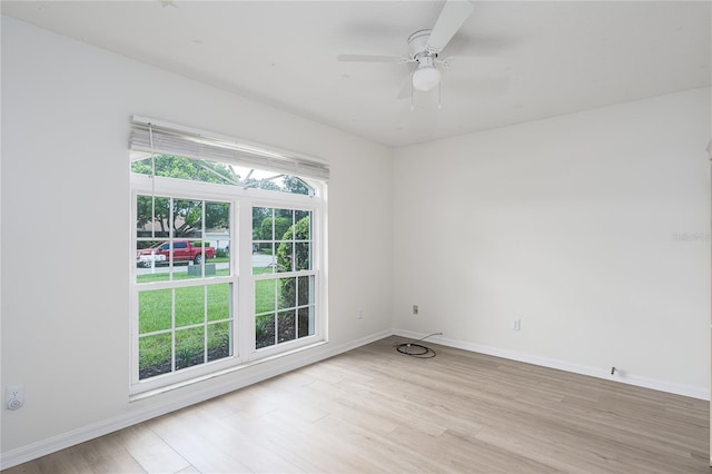 6114 68th Dr E, Palmetto, FL 34221 - spare room featuring light wood-style floors and a ceiling fan