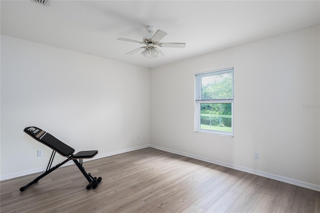6114 68th Dr E, Palmetto, FL 34221 - exercise area with wood finished floors and a ceiling fan