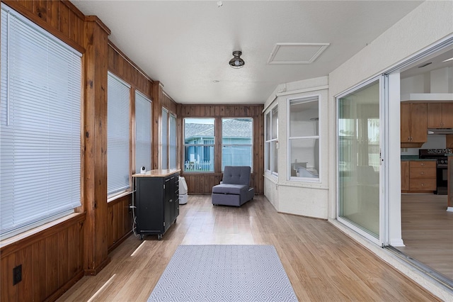 6114 68th Dr E, Palmetto, FL 34221 - sunroom featuring wood finished floors and wooden walls