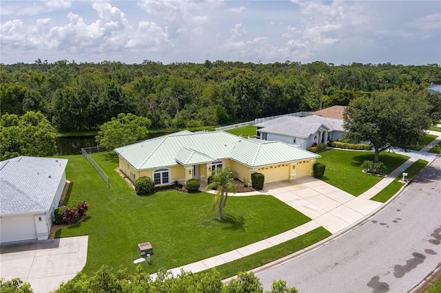 6114 68th Dr E, Palmetto, FL 34221 - view from above of property with a forest and a large body of water