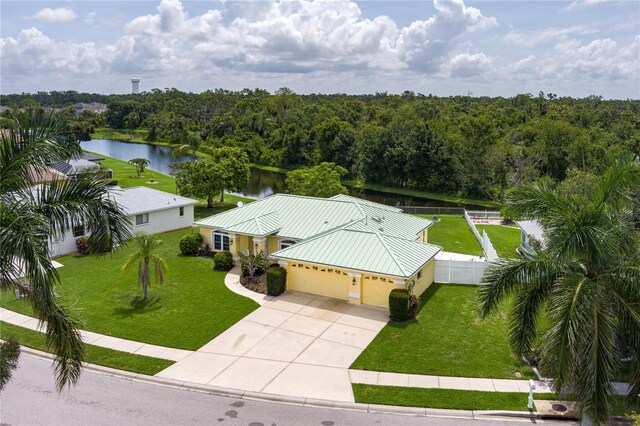 6114 68th Dr E, Palmetto, FL 34221 - view from above of property featuring a large body of water and a forest