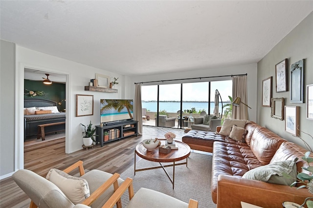 1510 1st Ave W Unit 102, Bradenton, FL 34205 - living area with light wood-style flooring
