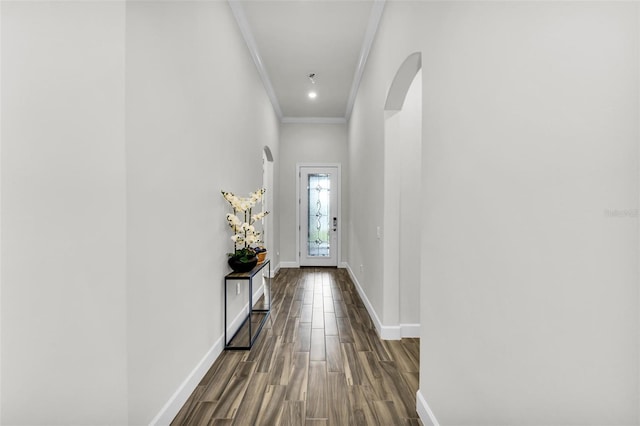 3379 Chestertown Loop, Bradenton, FL 34211 - doorway to outside with arched walkways, crown molding, and dark wood-style floors