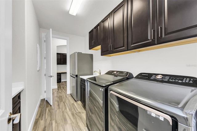 3379 Chestertown Loop, Bradenton, FL 34211 - laundry area with cabinet space and independent washer and dryer